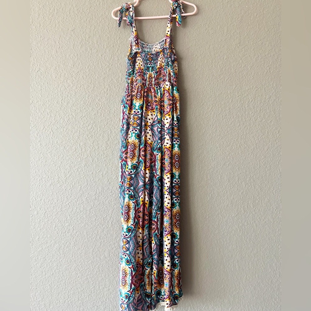 A Xtrodinary jumpsuit size small